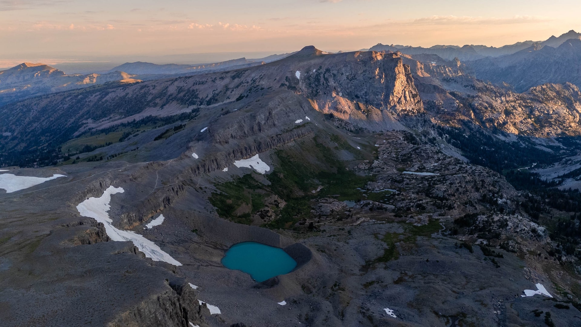 A small lake formed by the glacier above — Grand Teton National Park, Wyoming