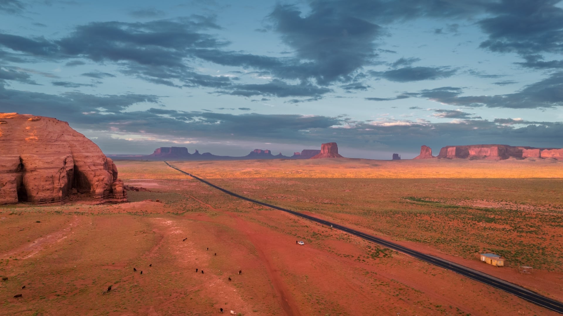 In the Distance, the Mesas Ignite — Monument Valley, UNITED STATES